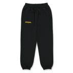 Black Borussia Dortmund urban sweatpants with a yellow logo on the front, perfect for fans and casual wear.