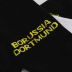 Lot de 2 paires de chaussettes de sport BVB en noir et blanc, ornées de l'inscription « Borussia Dortmund » en jaune, idéales pour les fans.