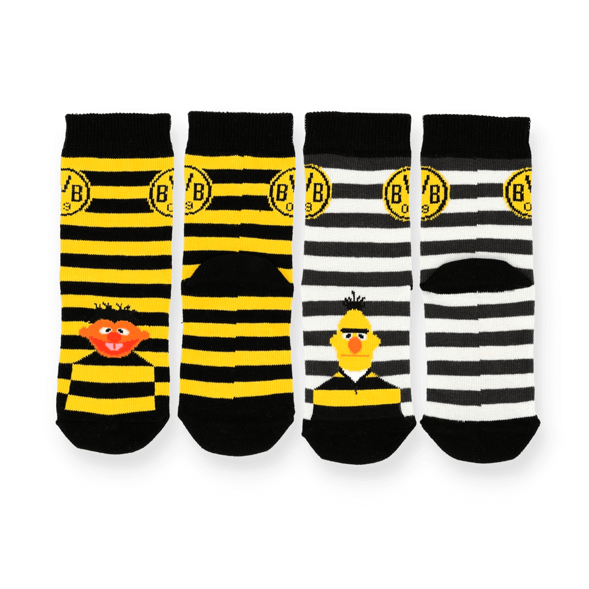 BVB Sesamstraße Socken-Set für Kinder mit vier Paaren Socken, jeweils mit gelb-schwarzen oder schwarz-weißen Streifen sowie Motiven von Bert und Ernie.