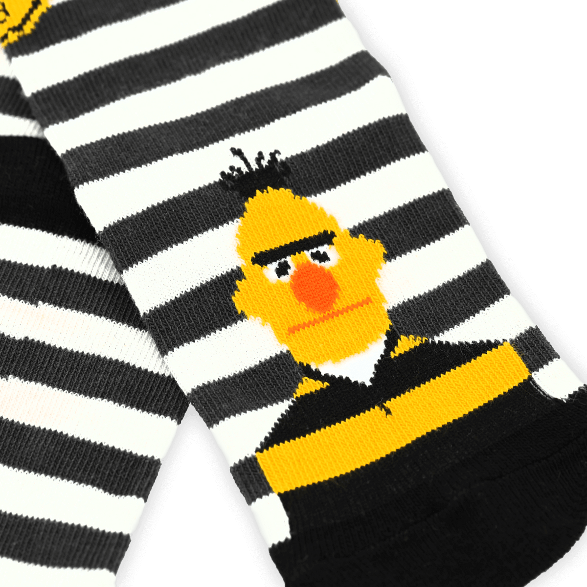 Calcetines a rayas negras y amarillas con el motivo de Bert, de Barrio Sésamo, ideales para los aficionados del BVB y aptos para niños.
