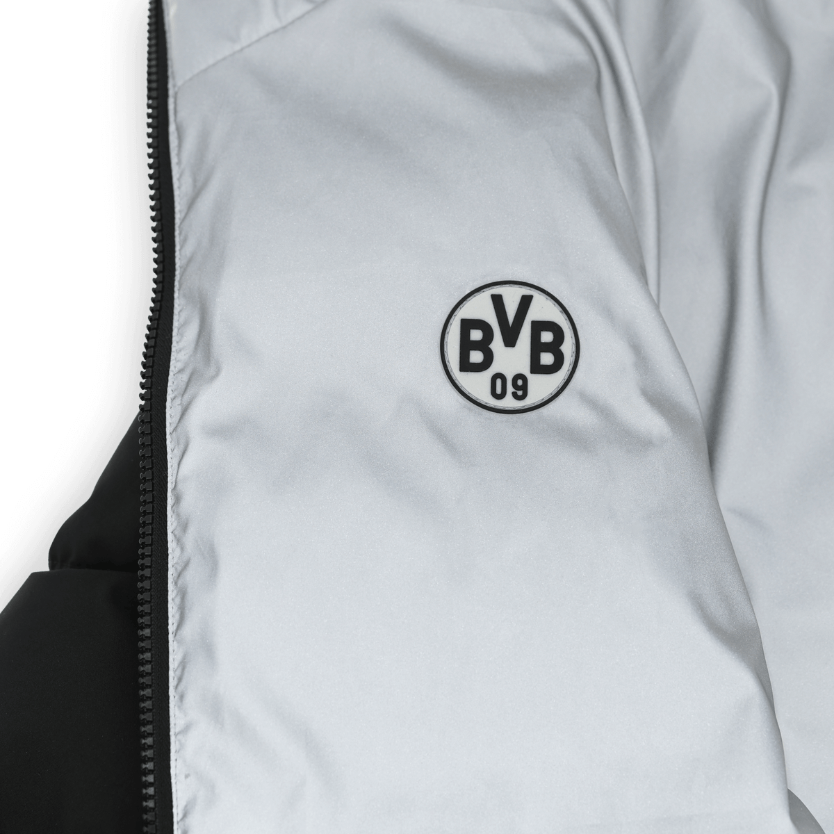Giacca reversibile riflettente del BVB con un lato nero e uno grigio e un logo BVB ben visibile.
