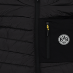 Veste de stade noire 2025 du Borussia Dortmund, avec le logo BVB, des détails de fermeture éclair jaunes et des poches pratiques, idéale pour les supporters au SIGNAL IDUNA PARK.