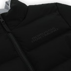 Black BVB reversible jacket for kids with reflective Borussia Dortmund lettering and a zipper—perfect for fans.