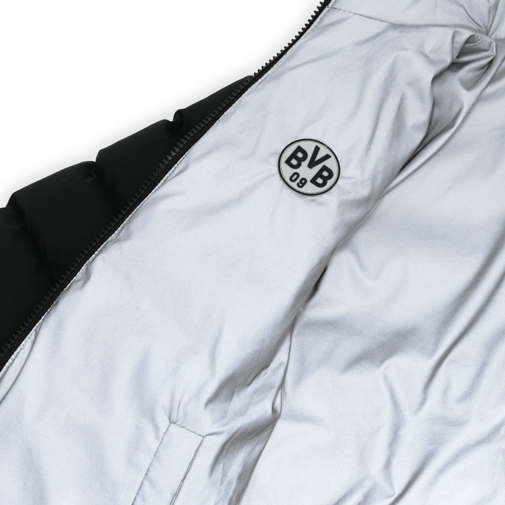 BVB reversible children's jacket with reflective white fabric, a black lining, and the BVB 09 logo; perfect for fans.