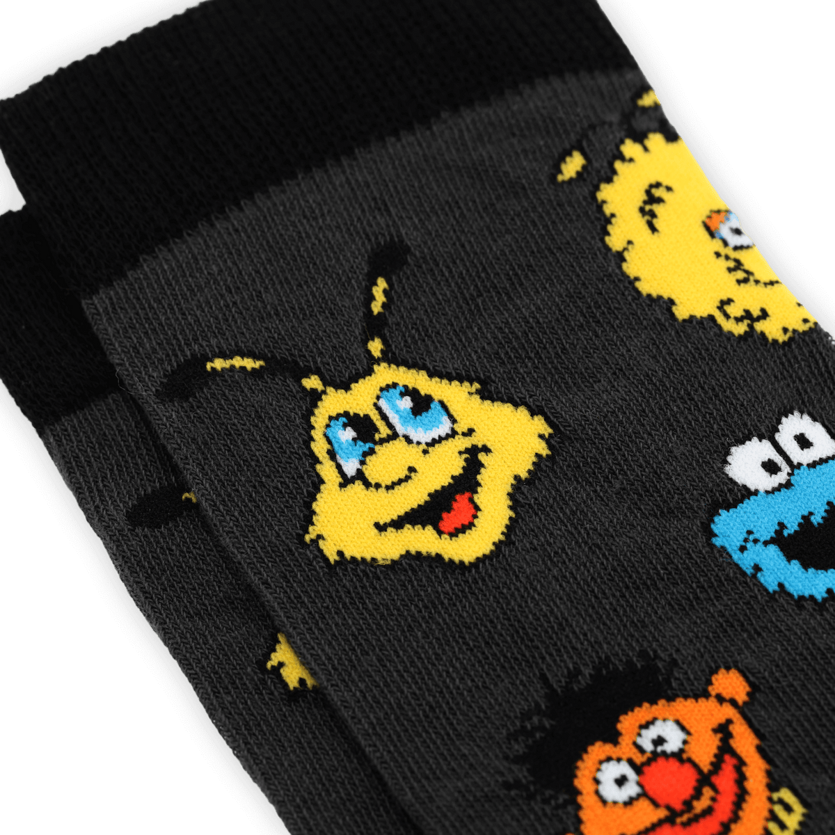 Schwarzgelbe BVB-Fansocken mit Sesamstraße-Motiven wie EMMA und weiteren Figuren, perfekt für kleine Fans von Borussia Dortmund.