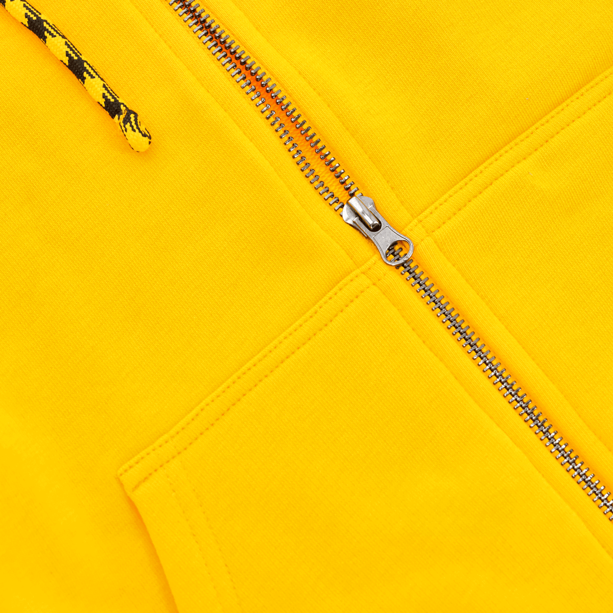 Yellow BVB sweatshirt jacket with a silver zipper and black-and-yellow drawstring—the perfect fan item for Borussia Dortmund fans.