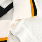 Weißes BVB Explorer I Polo mit schwarzgelbem Akzent am Kragen, sportliches Design, exklusive Borussia Dortmund Merchandise-Kollektion.
