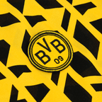 Camicia del BVB Festival II con un accattivante motivo giallo e nero e un vistoso stemma del BVB.