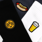 Calcetines BVB Festival II Icons en un pack de 3 con diseños exclusivos: el logotipo del BVB en negro y amarillo, y símbolos de perritos calientes y cerveza. Perfectos como artículos para aficionados.