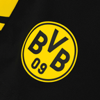 Black swim trunks with an eye-catching BVB 09 logo in yellow and black, perfect for Borussia Dortmund fans.
