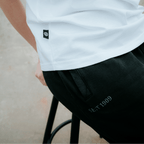 Pantalon de survêtement noir BVB pour femme, orné de l'inscription « Seit 1909 », idéal comme vêtement de loisirs et article de fan de la collection Borussia Dortmund