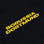 Pantalon de survêtement noir pour enfants avec l'inscription « Borussia Dortmund » en jaune, idéal pour les fans du BVB.
