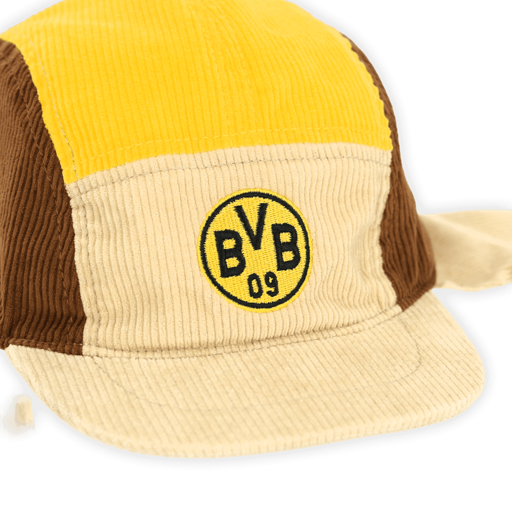 Gorra del BVB con bloques de color para bebés y niños pequeños, con el logotipo del BVB y una combinación de colores en negro, amarillo, marrón y beige.