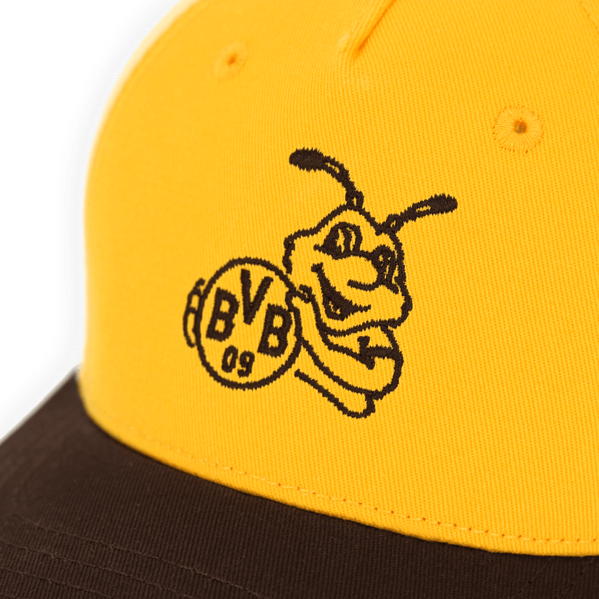 Cappellino giallo da neonato del BVB con stemma EMMA e visiera nera, ideale per i piccoli tifosi del Borussia Dortmund.