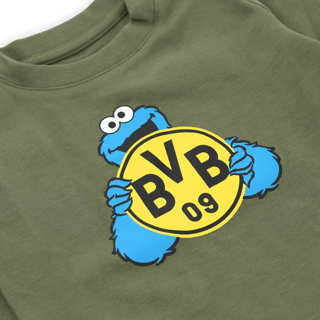 Green jogging set for babies and toddlers featuring the BVB logo and Cookie Monster from Sesame Street as a design highlight.