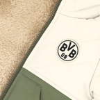 Veste d'hiver bicolore du BVB, verte et beige, pour bébés et jeunes enfants, avec logo BVB 09 bien visible et fermeture éclair, idéale pour les journées froides.
