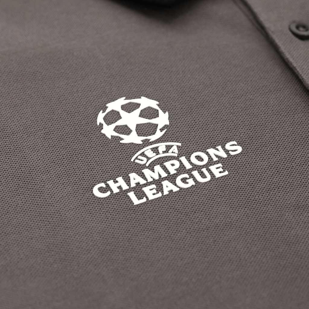 Gray BVB polo shirt with the UEFA Champions League logo in high-quality embroidery, official fan merchandise from the 2025 Champions League collection.