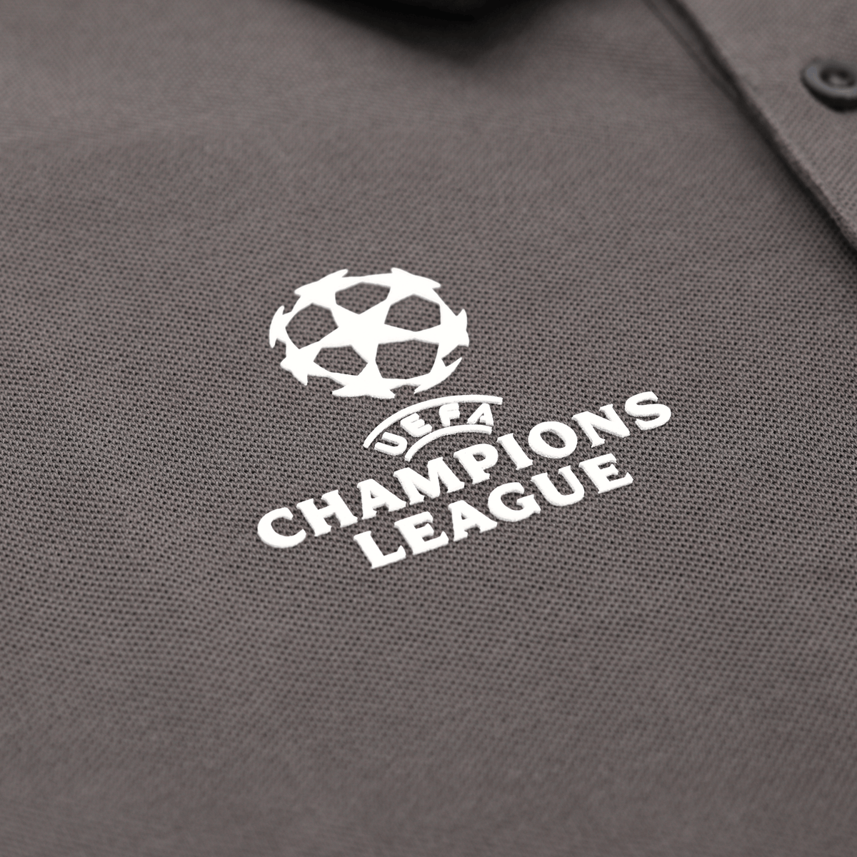 Gray BVB polo shirt with the UEFA Champions League logo in high-quality embroidery, official fan merchandise from the 2025 Champions League collection.