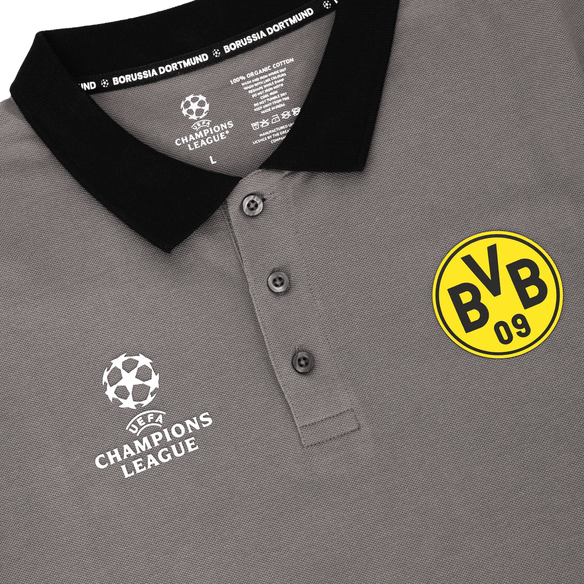 Gray polo shirt from the BVB Champions League 2025 collection with a black collar, yellow BVB emblem, and white "UEFA Champions League" lettering on the chest.