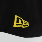 Black BVB New Era 9Twenty cap for kids, high-quality design with a yellow embroidered logo on black fabric. Perfect for young Borussia Dortmund fans.