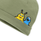 Green baby hat featuring EMMA, the yellow BVB mascot, and the Cookie Monster from Sesame Street; the perfect Borussia Dortmund fan item for kids.