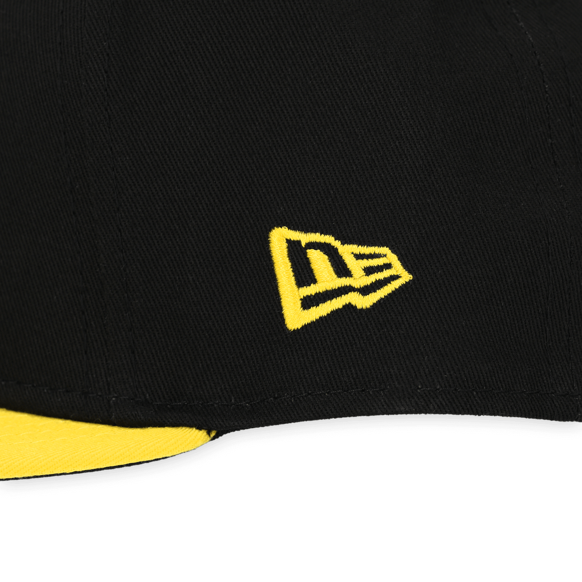 New Era 品牌黑色多特蒙德（BVB）棒球帽，型号为 9Fifty Snapback Classic Kids，侧面饰有黄色 New Era 标志，采用黑黄双色设计。