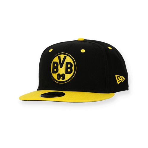 Schwarze BVB Snapback-Cap von New Era im 9Fifty-Design für Kinder, mit gelbem Schirm und BVB-Logo auf der Vorderseite.
