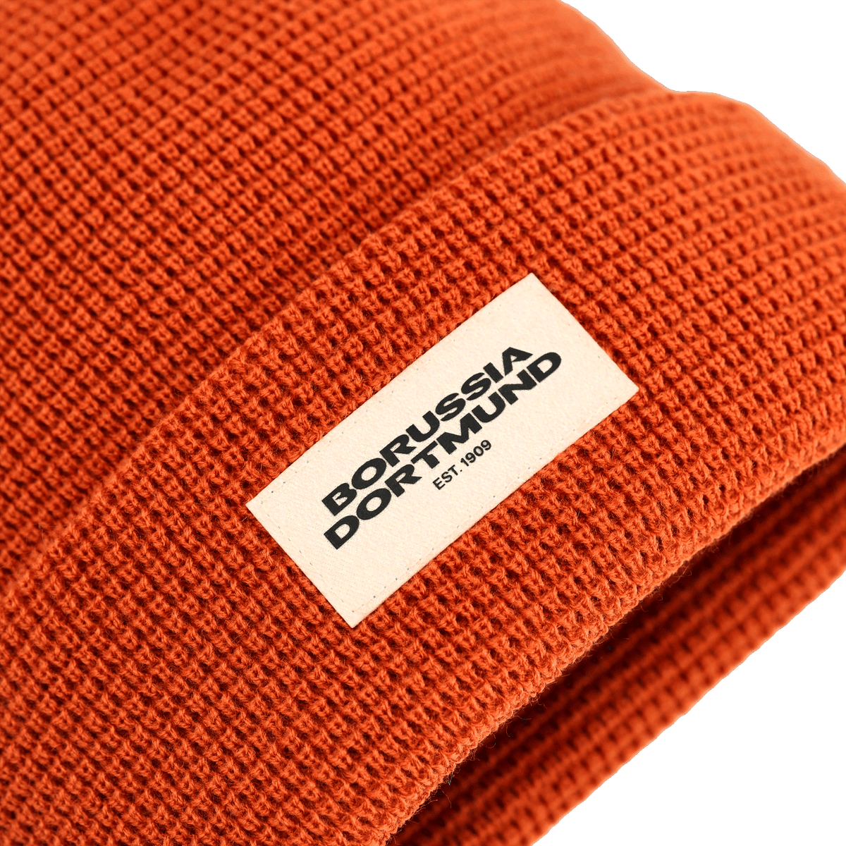 Orange BVB-Mütze aus Waffle-Strick von New Era mit aufgenähtem Patch mit dem Borussia Dortmund Logo.