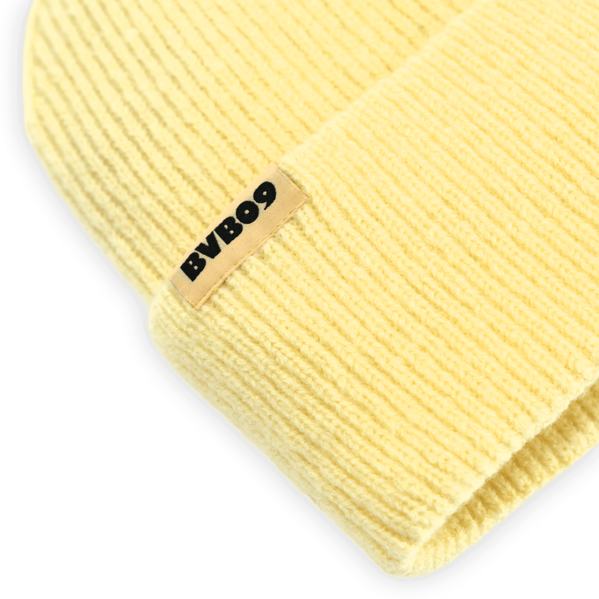 Cappellino del BVB giallo pastello in maglia con etichetta BVB09, ideale per i tifosi del Borussia Dortmund.