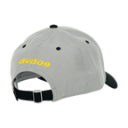 Vista posteriore di un cappellino grigio del BVB con il logo giallo BVB09 e una chiusura nera regolabile.