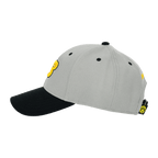 Cappellino grigio del BVB con visiera nera, dettagli gialli e logo del BVB, vista laterale. Articolo per tifosi del Borussia Dortmund.
