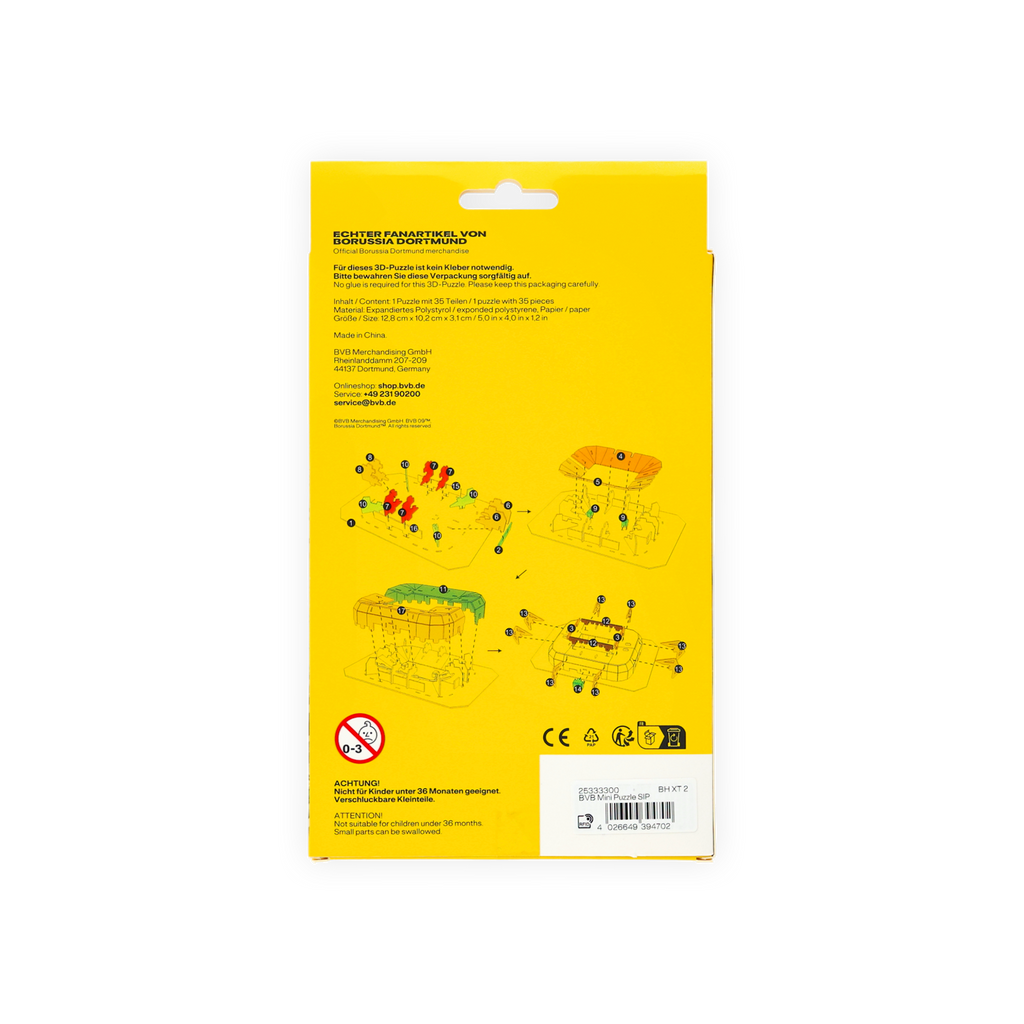 Die Rückseite einer gelben Verpackung für ein BVB 3D-Mini-Puzzle mit Aufbauanleitung, Produktinfos und Warnhinweisen, hergestellt als offizieller Borussia Dortmund Fanartikel.