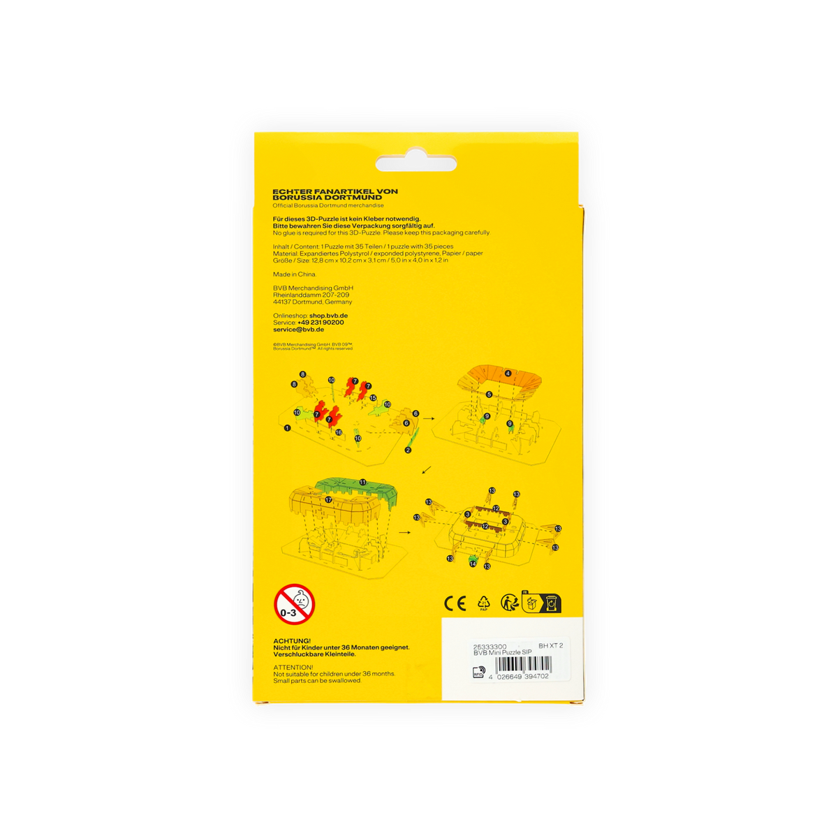 Die Rückseite einer gelben Verpackung für ein BVB 3D-Mini-Puzzle mit Aufbauanleitung, Produktinfos und Warnhinweisen, hergestellt als offizieller Borussia Dortmund Fanartikel.