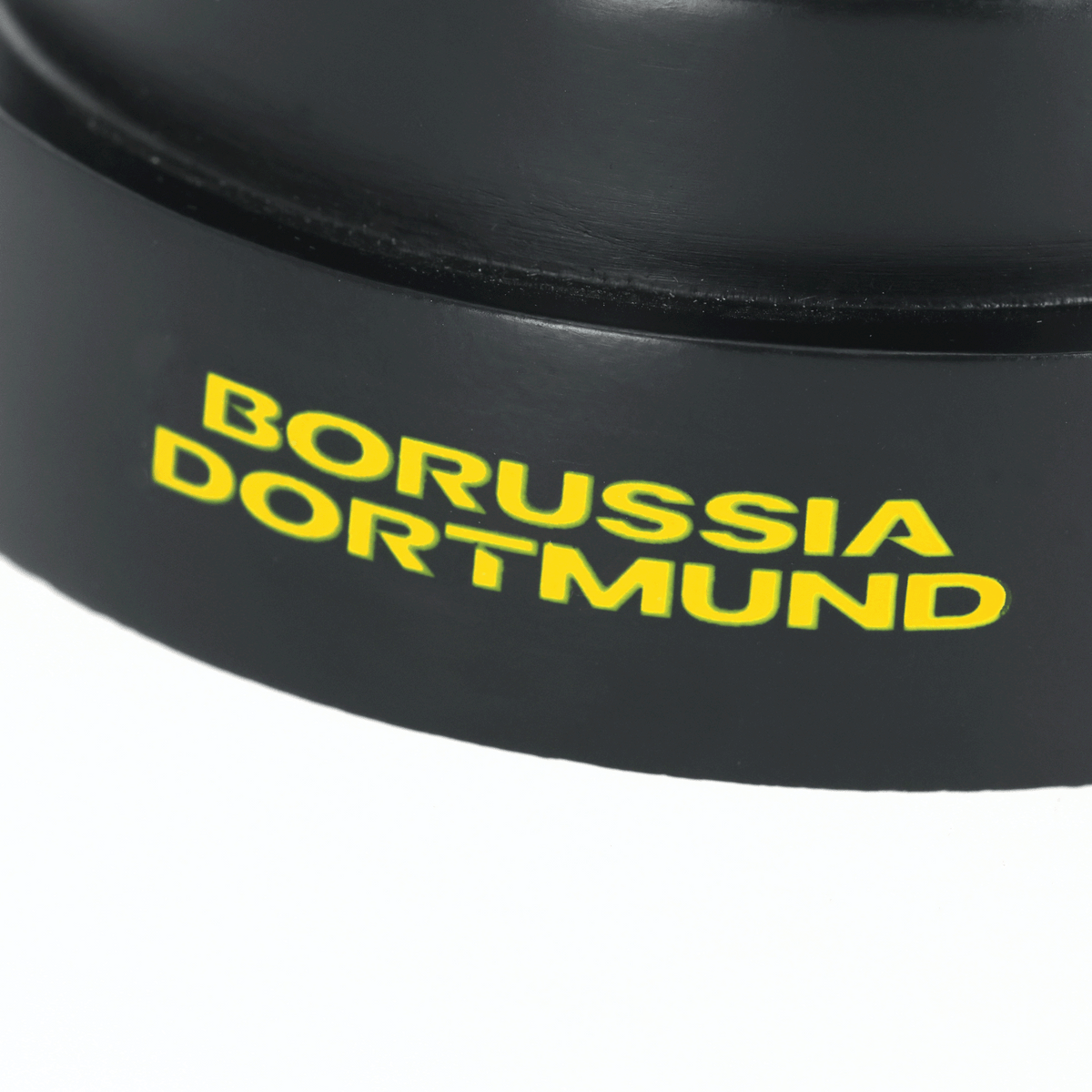 Black BVB dream ball with yellow "Borussia Dortmund" lettering, perfect as a fan item or decoration.