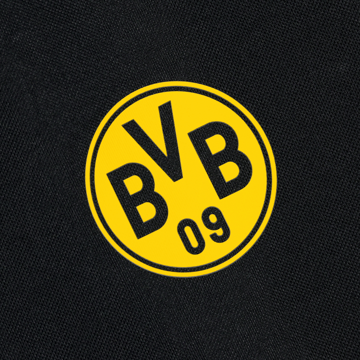 Sac à dos noir et jaune du BVB, modèle 2026, orné d'un logo BVB 09 bien visible sur du tissu noir, idéal pour les supporters du Borussia Dortmund