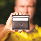 Black BVB card case made of high-quality leather with an embossed BVB logo and a design by Jaimie Jacobs, ideal for Borussia Dortmund fans.