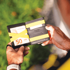BVB Flap Boy Slim Wallet by Jaimie Jacobs in black and yellow with elastic yellow straps—perfect for cards and bills—Borussia Dortmund fan merchandise.