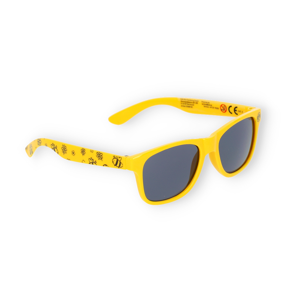Gelbe Kindersonnenbrille mit schwarzem BVB-Logo und schwarzgelbem Design auf den Bügeln, ideal für junge BVB-Fans.