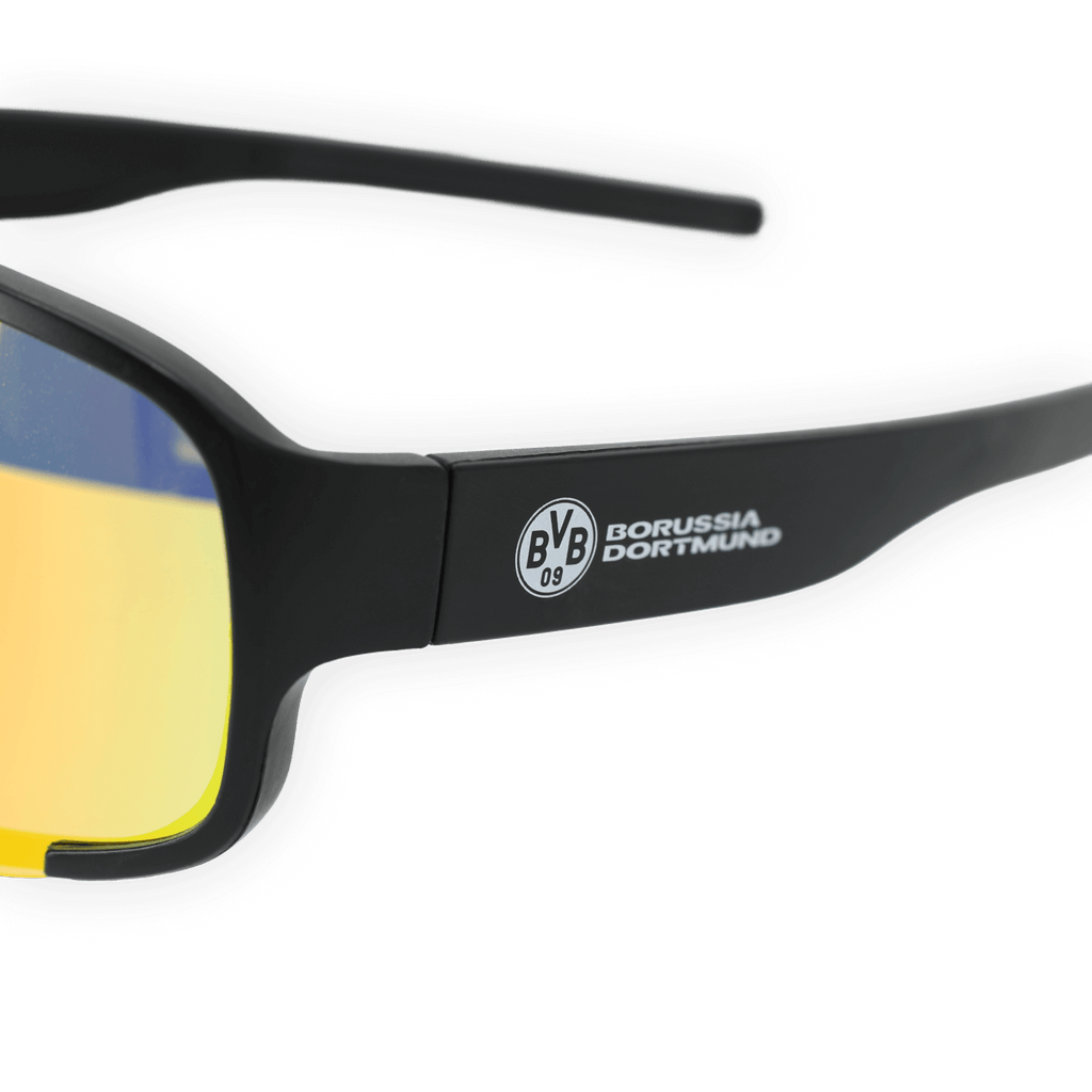 Vue de profil des lunettes BVB « rapides » avec des branches noires, des verres jaunes, le logo BVB 09 et l'inscription « Borussia Dortmund » sur la branche.