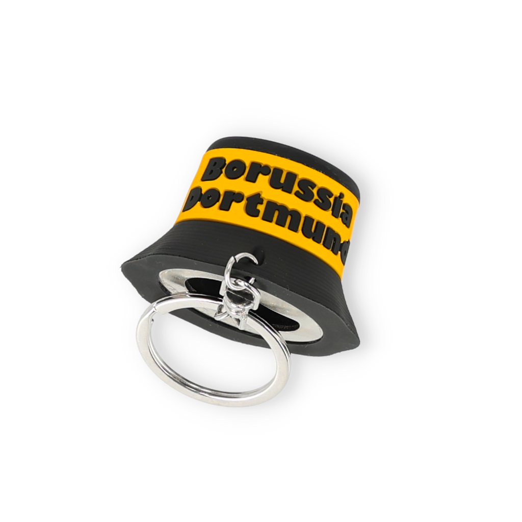 Porte-clés du BVB en forme de chapeau de pêcheur noir et jaune. Doté d'un décapsuleur intégré et d'un logo « Borussia Dortmund » bien visible, il est idéal pour les fans de football.