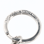 Silver-colored metal BVB keychain featuring the "Borussia Dortmund" logo—the perfect accessory for fans.