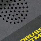 Detailaufnahme eines schwarzen BVB-Merchandise-Artikels mit Lochmuster und gelbem Schriftzug.