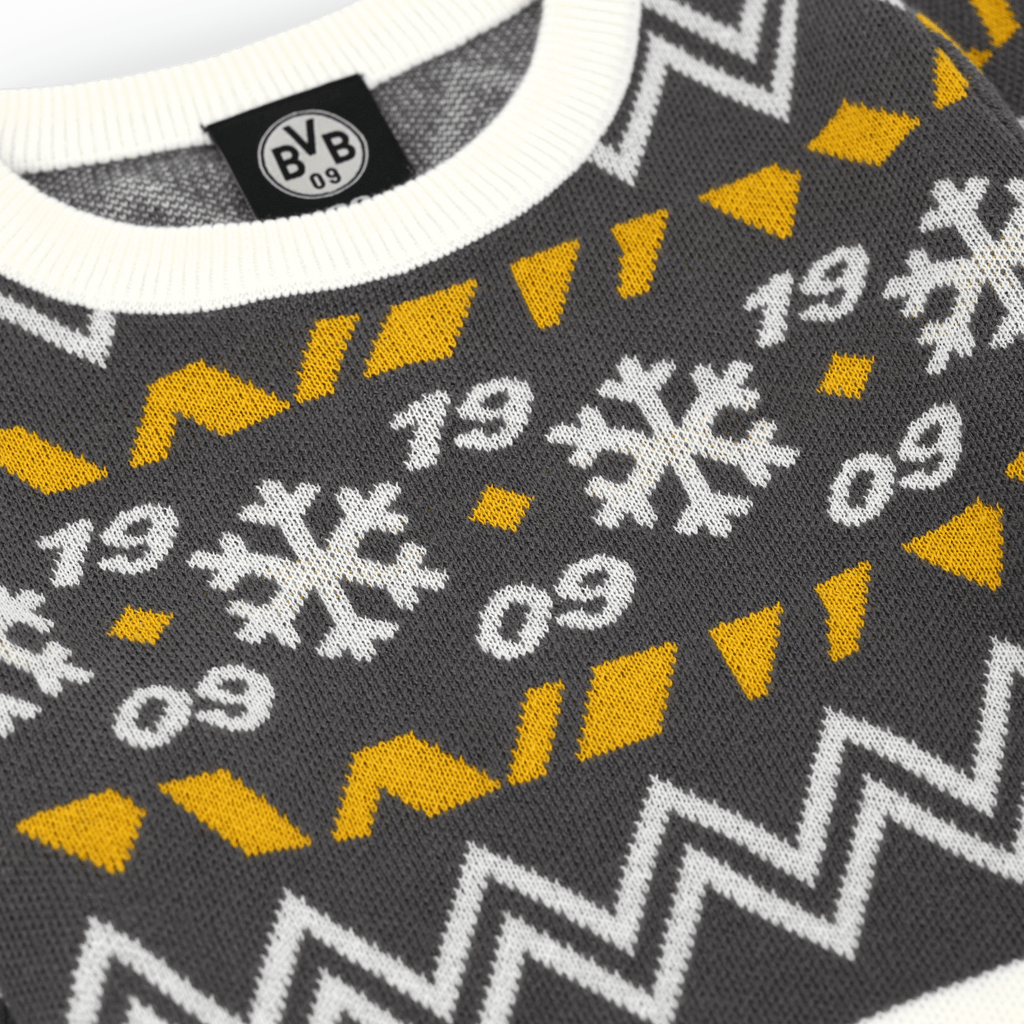 Maglione grigio per bambini del BVB con collo bianco, motivo a zigzag giallo e bianco, fiocchi di neve e logo BVB 09. Perfetto per l'inverno.