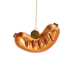 Goldfarbener BVB-Weihnachtsbaum-Anhänger in Bratwurstform mit Grillmarkierungen, glitzerndem Finish und schwarzem BVB 09-Emblem.