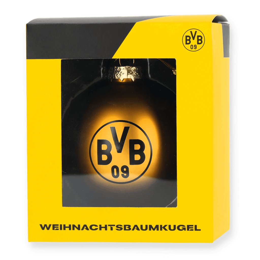 Une boule de Noël noire et jaune arborant le logo du BVB, emballée dans un coffret cadeau du BVB.