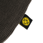 Schwarzgelbe BVB-Wärmflasche mit gestricktem Design und BVB 09-Logo, ideal für Fans.