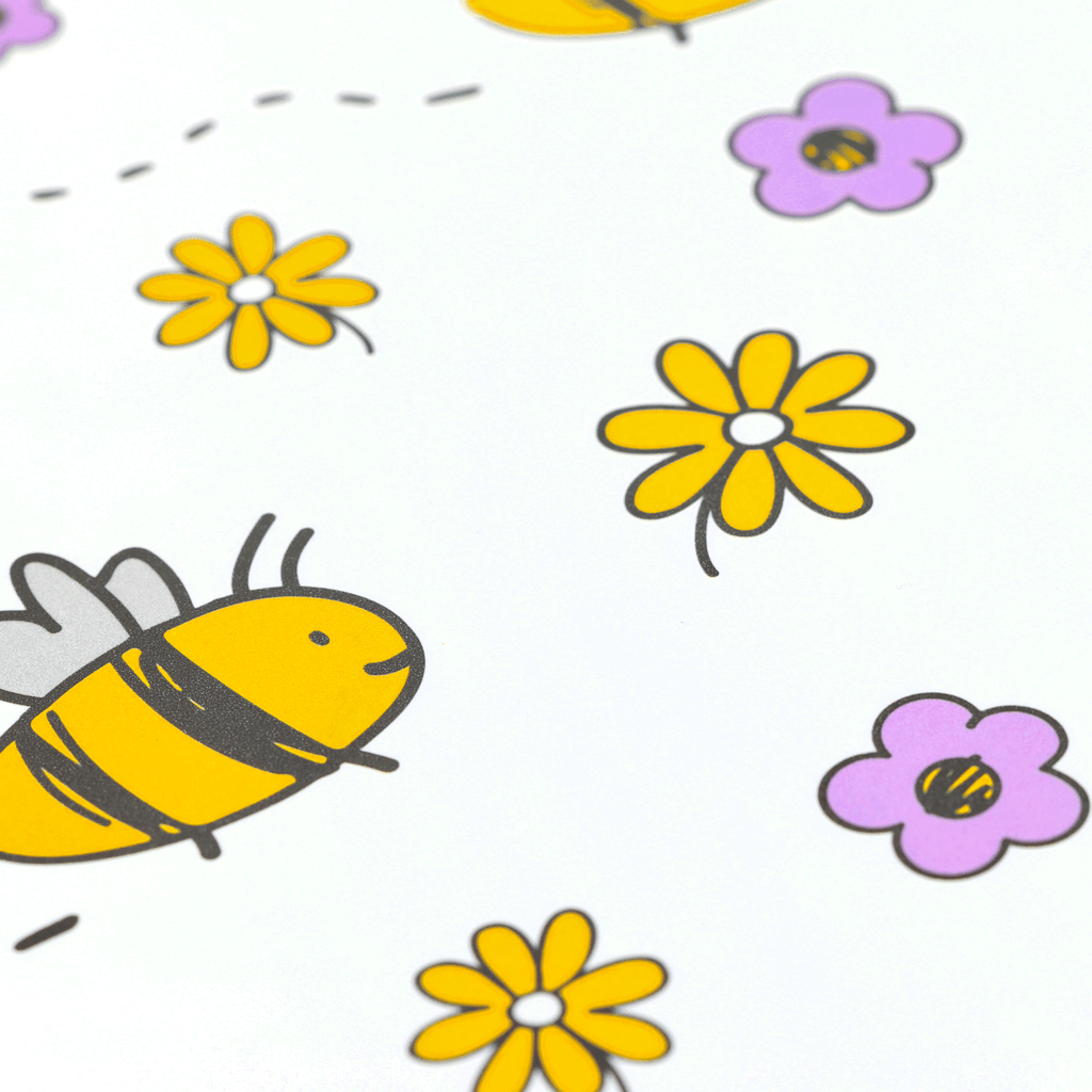 A set of two BVB placemats for children, featuring a bee design and yellow and purple flowers; perfect for young Borussia Dortmund fans.