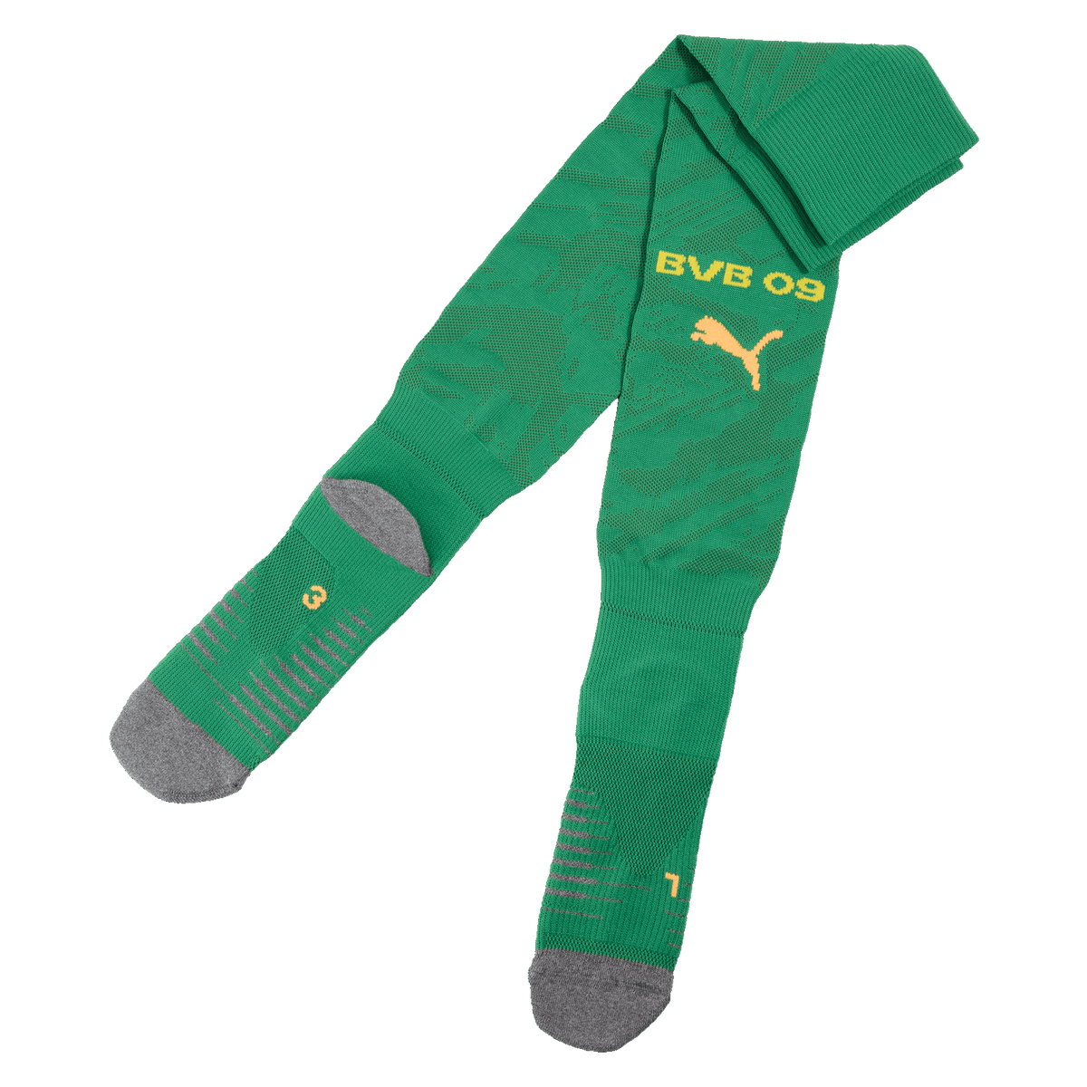 Chaussettes de football vertes du Borussia Dortmund pour la saison 2025/26, avec le logo PUMA et l'inscription « BVB 09 » en jaune, bouts renforcés en gris.