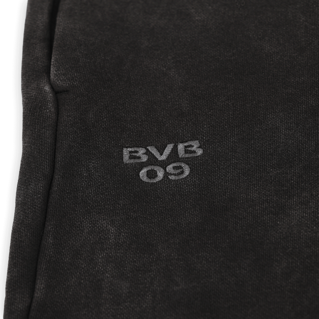 Black women's sweatpants from the BVB PUMA Ess Elevated collection with an embroidered BVB 09 logo, perfect for leisure and sports.