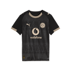Elegante maglia da calcio nera del BVB con dettagli dorati, logo BVB, logo PUMA e scritta Vodafone.